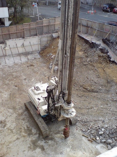 Construction drill auger